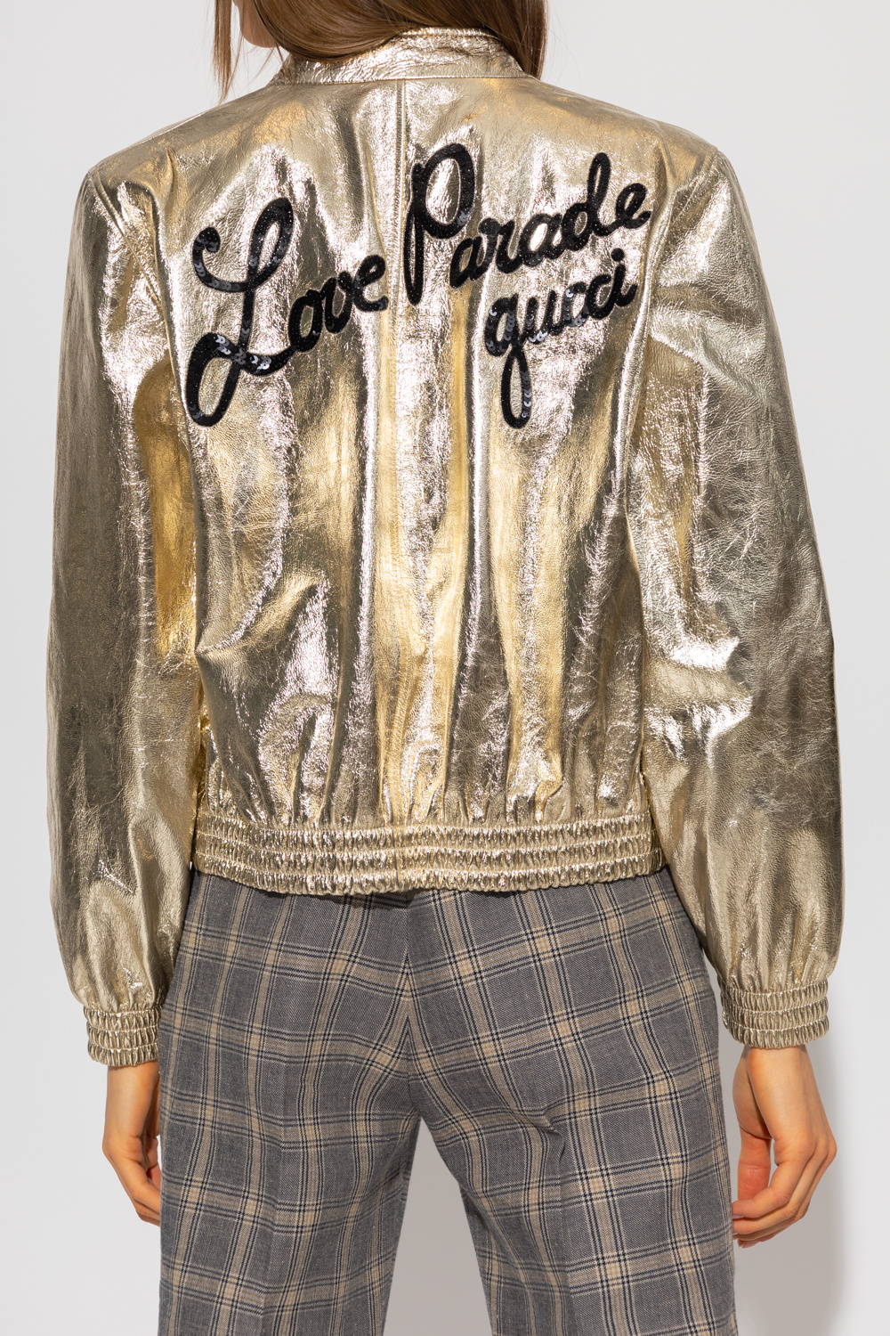 Gucci gold cheap bomber jacket